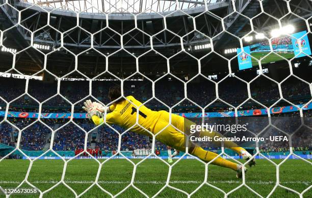 Yann Sommer of Switzerland makes a save from Rodri of Spain during the penalty shoot out during the UEFA Euro 2020 Championship Quarter-final match...