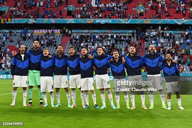 The Italy players sing their national anthem prior to the UEFA Euro 2020 Championship Quarter-final match between Belgium and Italy at Football Arena...