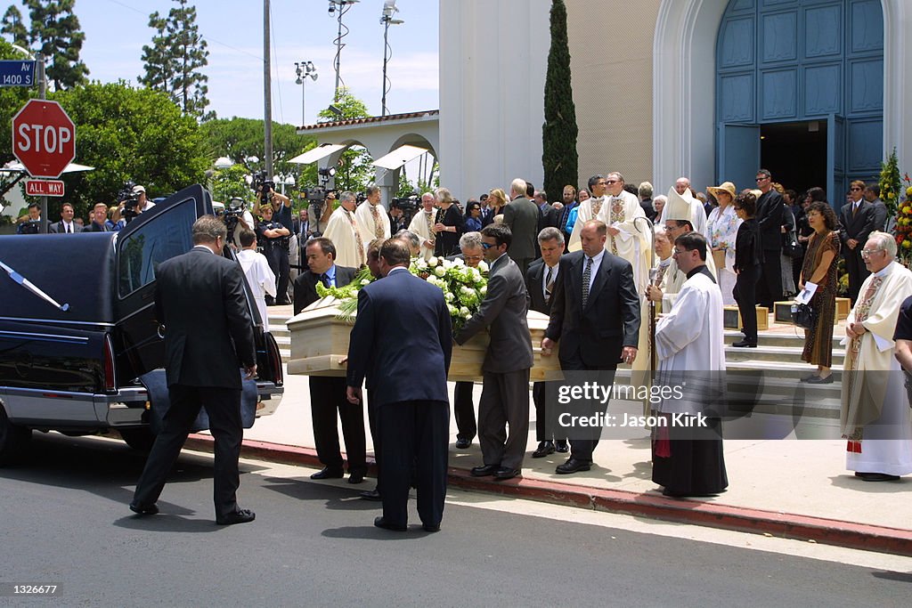 Pallbearers carry the coffin of actor Carroll O''Connor after funeral