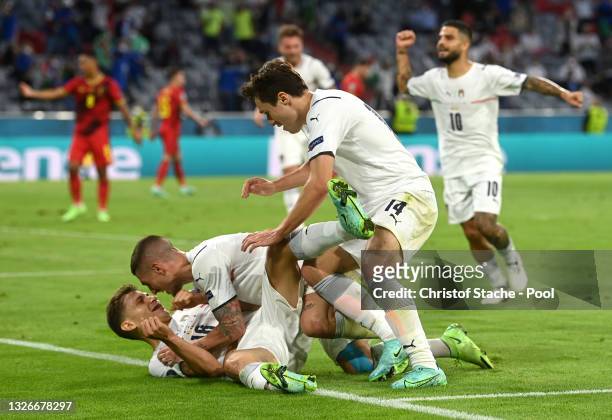 Nicolo Barella of Italy celebrates with Marco Verratti and Federico Chiesa after scoring their side's first goal during the UEFA Euro 2020...