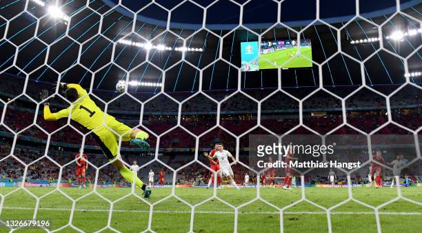 Thibaut Courtois of Belgium fails to save the Italy second goal scored by Lorenzo Insigne during the UEFA Euro 2020 Championship Quarter-final match...