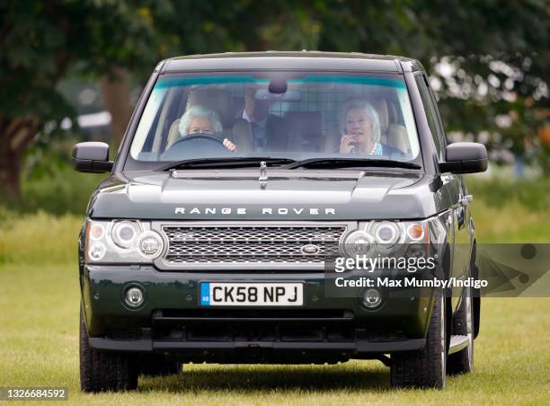 Queen Elizabeth II seen driving her Range Rover car, accompanied by her lady-in-waiting Dame Annabel Whitehead, as she attends day 2 of the Royal...