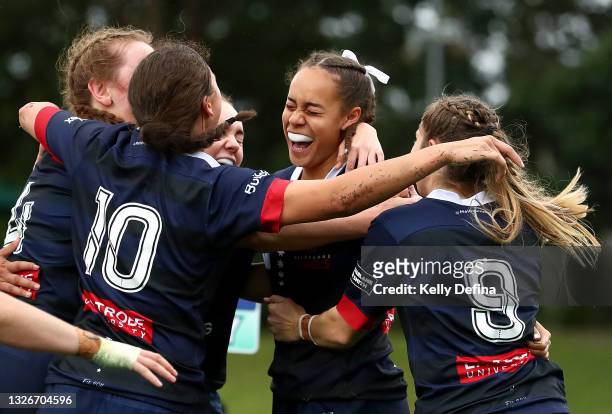Kelera Ratu of the Rebels celebrates scoring a try during the Super W match between the Melbourne Rebels and the ACT Brumbies at Coffs Harbour...
