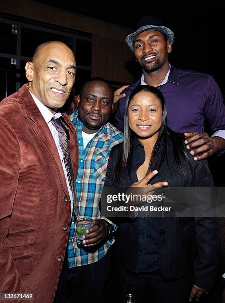 Andre Cleveland, guest, Lesley Commissiong and NBA player Ron Artest aka Metta World Peace of the Los Angeles Lakers celebrate Artest's birthday at...