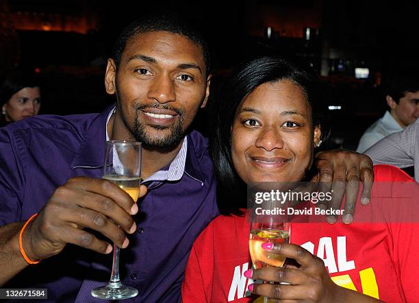 Player Ron Artest aka Metta World Peace of the Los Angeles Lakers and his wife, Kimsha Artest celebrate his birthday at the Lavo Restuarant at The...