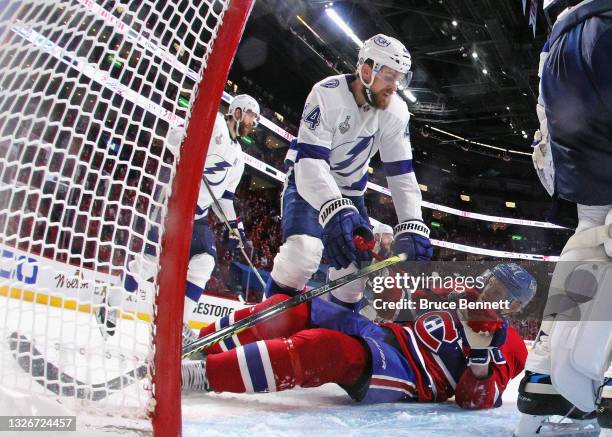 Jan Rutta of the Tampa Bay Lightning checks Corey Perry of the Montreal Canadiens during Game Three of the 2021 NHL Stanley Cup Final at the Bell...