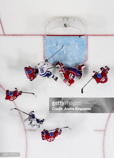 Tyler Johnson of the Tampa Bay Lightning scores a goal past Carey Price of the Montreal Canadiens during the third period in Game Three of the 2021...