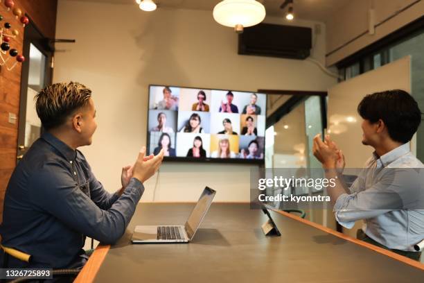 new age videoconference meeting in asia - digital transformation stock pictures, royalty-free photos & images
