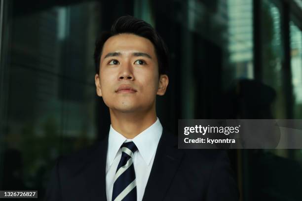 portrait of young businessman - japanese ethnicity stock pictures, royalty-free photos & images