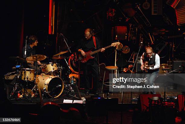 Frank Kennedy, Chip Graham, and Mark Jones of Tin Can Buddah performs at Bomhard Theater on November 12, 2011 in Louisville, Kentucky.