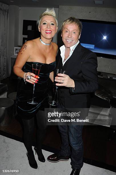 Caroline Monk and Royston Blythe attend Phil Turner's 42nd Birthday hosted by Tamara Ecclestone at a private residence on November 12, 2011 in...