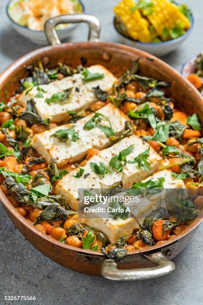 baked feta and chickpeas - feta cheese stock pictures, royalty-free photos & images