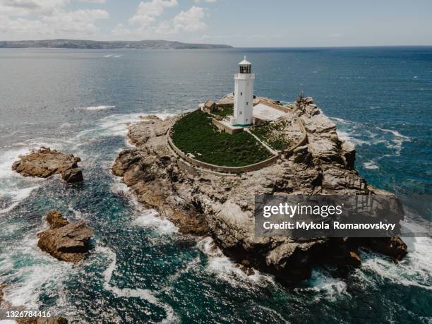 godrevy's lighthouse on the eponymous island in the sunny st ives bay. june 03, 2021 - st ives cornwall stock-fotos und bilder