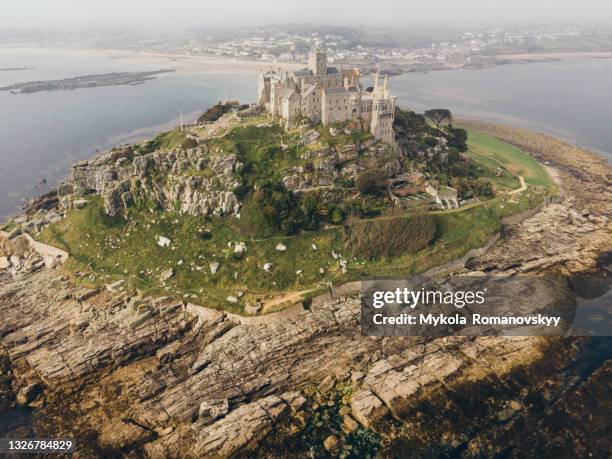 rocky footpath connects st michael mountain with mainland in mount's bay, cornwall, england. june 02, 2021 - social history stock pictures, royalty-free photos & images