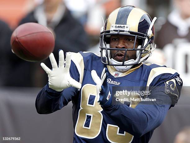 Wide receiver Mark Clayton of the St. Louis Rams catches a pass before their game against the Cleveland Browns at Cleveland Browns Stadium on...