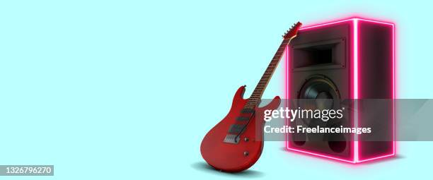 stockillustraties, clipart, cartoons en iconen met electric guitar and speaker amplifier lit up with red neon lights concept on a blue background 3d rendering - guitar amp