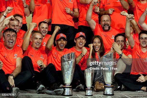 Lewis Hamilton of Great Britain and McLaren Celebrates winning with Jenson Button of Great Britain and McLaren, Martin Whitmarsh of Great Britain and...