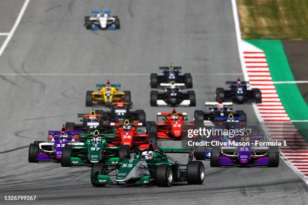 Jamie Chadwick of Great Britain and Veloce Racing leads the field into turn one at the start during the W Series Round 2 race at Red Bull Ring on...