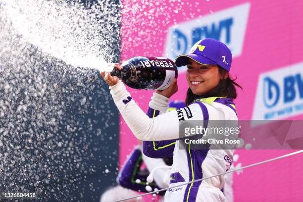 Race winner Jamie Chadwick of Great Britain and Veloce Racing celebrates on the podium during the W Series Round 2 race at Red Bull Ring on July 03,...