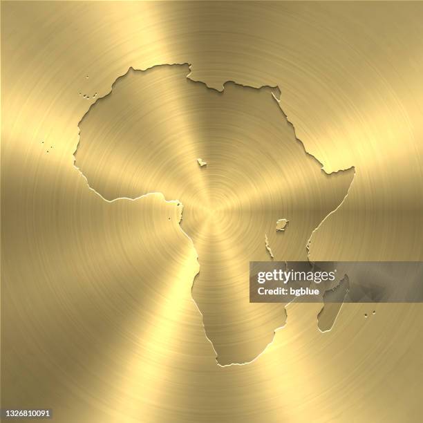 africa map on gold background - circular brushed metal texture - mauritius stock illustrations