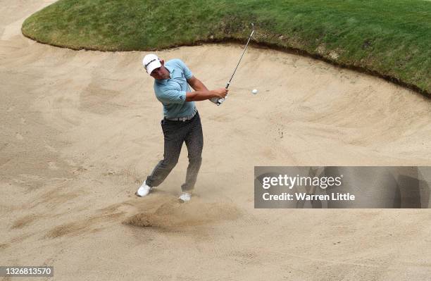 Lucas Herbert of Australia plays from the green-side bunker on the 14th hole during Day Three of The Dubai Duty Free Irish Open at Mount Juliet Golf...