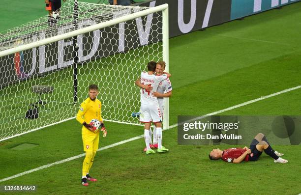 Kasper Dolberg of Denmark celebrates with Mikkel Damsgaard after scoring their side's second goal during the UEFA Euro 2020 Championship...