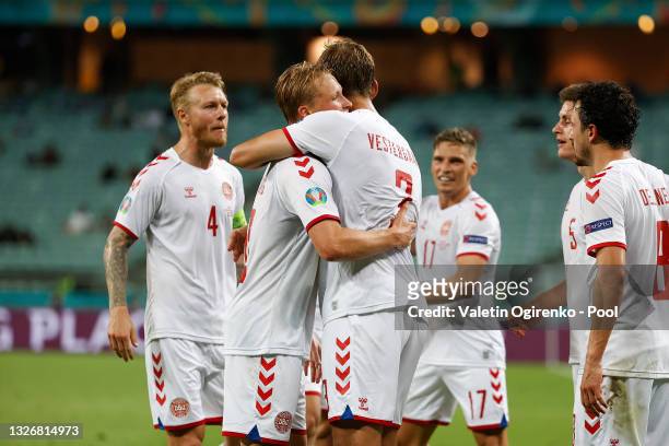 Kasper Dolberg of Denmark celebrates with Jannik Vestergaard after scoring their side's second goal during the UEFA Euro 2020 Championship...