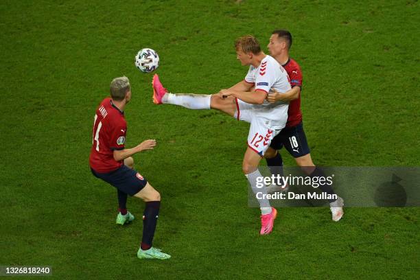 Kasper Dolberg of Denmark controls the ball whilst under pressure from Jan Boril of Czech Republic during the UEFA Euro 2020 Championship...