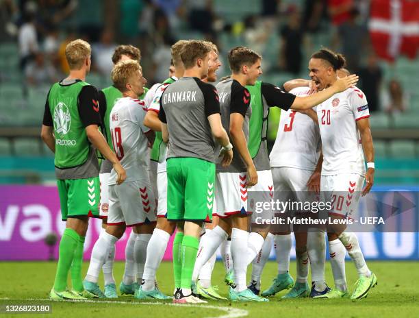 Yussuf Poulsen of Denmark celebrates with teammates after victory in the UEFA Euro 2020 Championship Quarter-final match between Czech Republic and...