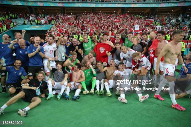 Players of Denmark celebrate their side's victory in front of the fans after the UEFA Euro 2020 Championship Quarter-final match between Czech...