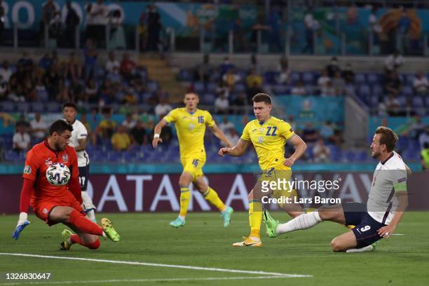 Harry Kane of England scores their side's first goal past Georgiy Bushchan of Ukraine during the UEFA Euro 2020 Championship Quarter-final match...
