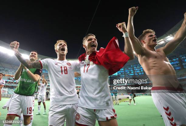 Daniel Wass and Jens Stryger Larsen of Denmark celebrates their side's victory after the UEFA Euro 2020 Championship Quarter-final match between...