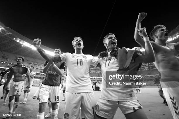 Daniel Wass and Jens Stryger Larsen of Denmark celebrates their side's victory after the UEFA Euro 2020 Championship Quarter-final match between...