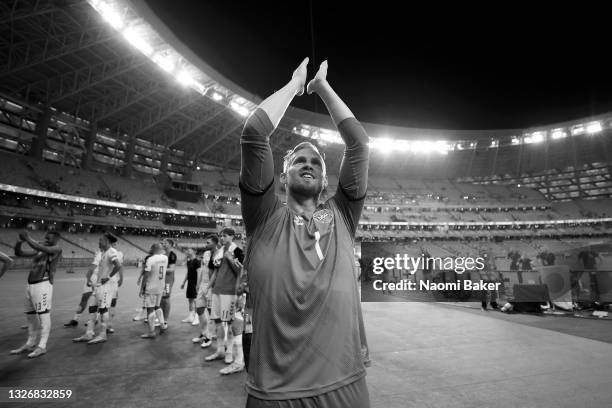 Kasper Schmeichel of Denmark celebrates their side's victory after the UEFA Euro 2020 Championship Quarter-final match between Czech Republic and...