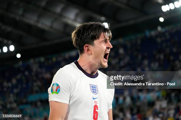 Harry Maguire of England celebrates after scoring their side's second goal during the UEFA Euro 2020 Championship Quarter-final match between Ukraine...