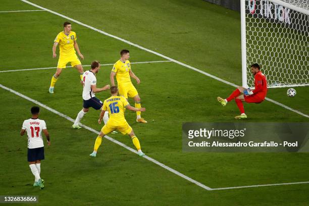 Harry Kane of England scores their side's third goal past Georgiy Bushchan of Ukraine during the UEFA Euro 2020 Championship Quarter-final match...