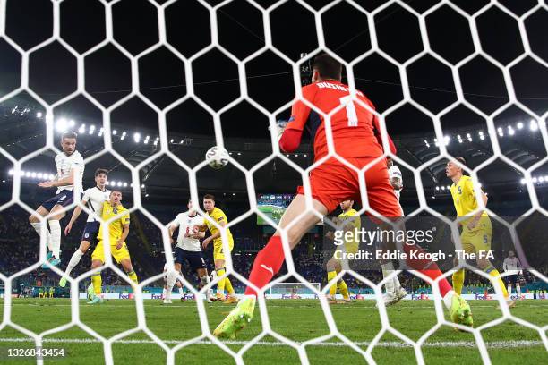 Jordan Henderson of England scores their side's fourth goal past Georgiy Bushchan of Ukraine during the UEFA Euro 2020 Championship Quarter-final...