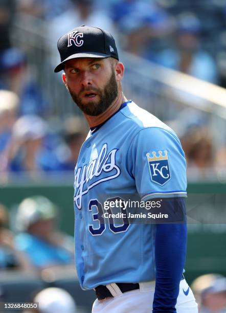 Starting pitcher Danny Duffy of the Kansas City Royals walks off the field after being pulled during the 4th inning of the game against the Minnesota...