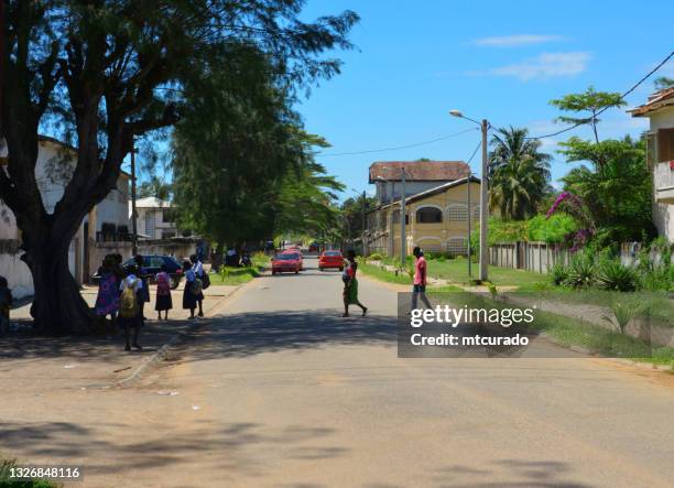 grand-bassam - children on boulevard treich-laplène, ivory coast's first colonial capital - ivory coast - ivory coast town bildbanksfoton och bilder
