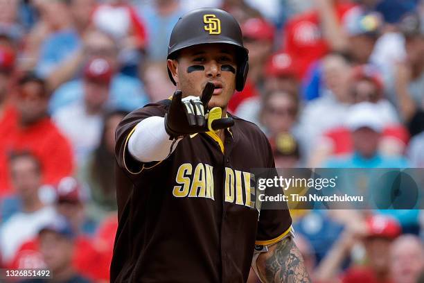 Manny Machado of the San Diego Padres celebrates after hitting a two run home run during the first inning against the Philadelphia Phillies at...