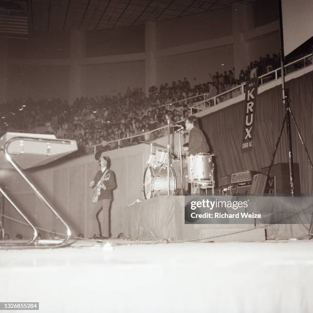 Pop group"The Monkees" perform on stage in Phoenix, Arizona. This concert was filmed for last episode of the first season of "The Monkees" tv show.