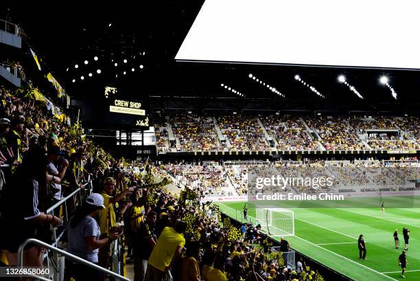 Columbus Crew supporters in the Nordecke cheer before the inaugural game at Lower.com Field between the Columbus Crew and New England Revolution on...