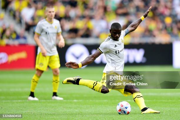 Jonathan Mensah of Columbus Crew clears the ball in the second half during their game against the New England Revolution at Lower.com Field on July...