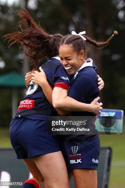 Kelera Ratu of the Rebels celebrates her try with Jemma Collins of the Rebels during the Super W match between the Melbourne Rebels and the ACT...