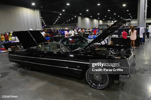 Classic Chevrolet Impala automobile on display during DJ Envy's Drive Your Dreams Car Show at Georgia World Congress Center on July 03, 2021 in...