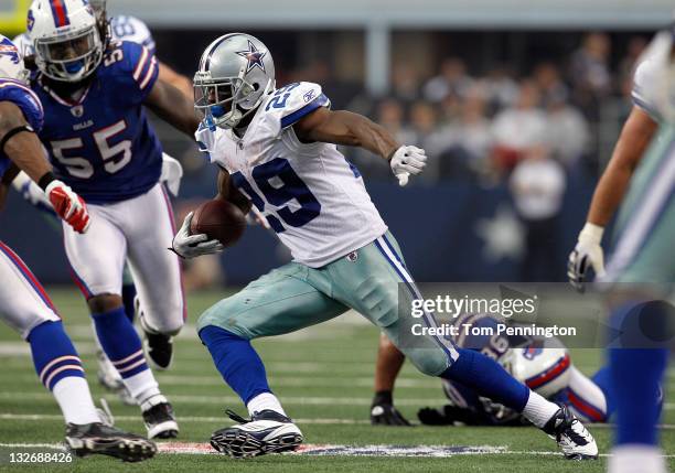 DeMarco Murray of the Dallas Cowboys carries the ball against Kelvin Sheppard of the Buffalo Bills at Cowboys Stadium on November 13, 2011 in...