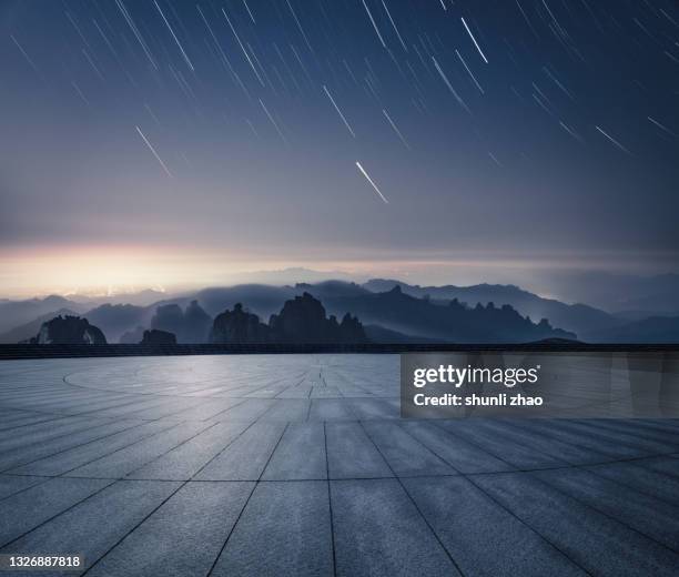 the empty platform on the top of laoshan mountain in qingdao under the starry sky - north star background stock pictures, royalty-free photos & images