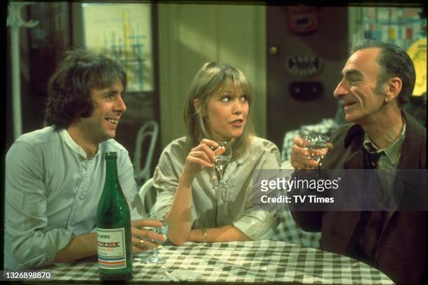 Richard O'Sullivan, Tessa Wyatt and David Kelly in charcter as Robin, Vicky and Albert on the set of sitcom Robin's Nest, circa 1979.