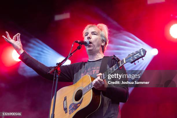Olli Schulz performs live onstage during the BonnLive Kulturgarten Open Air Festival on July 03, 2021 in Bonn, Germany.