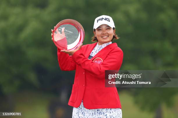 Ai Suzuki of Japan poses with the trophy after winning the tournament following the final round of the Shiseido Ladies Open at Totsuka Country Club...